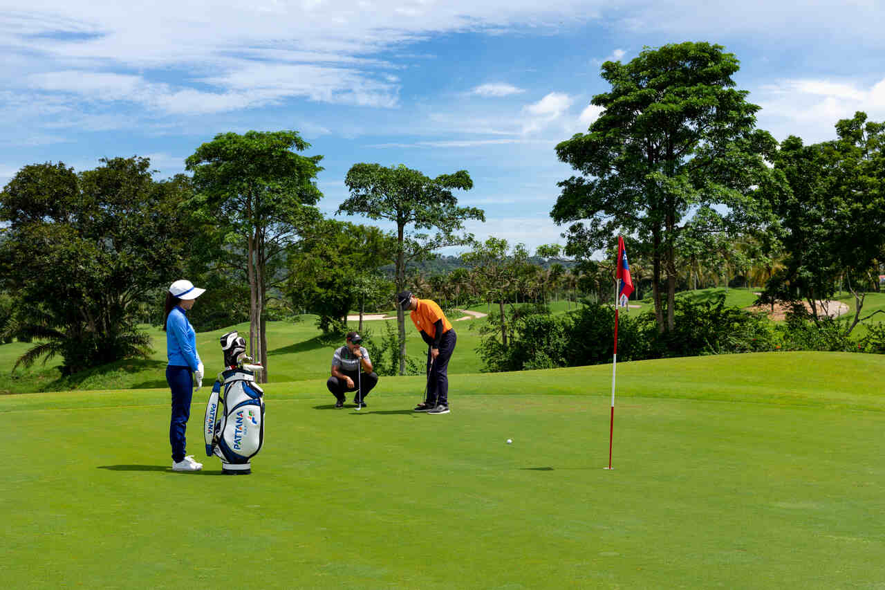 Pattana Resort - People Golfing on Sunny Day